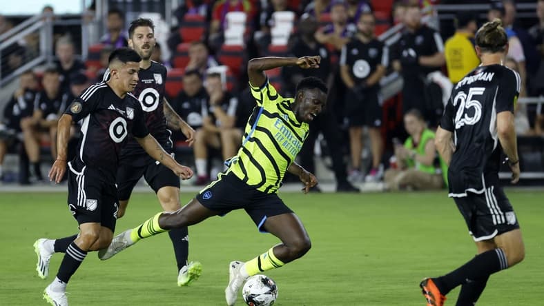 Jul 19, 2023; Washington, DC, USA; MLS midfielder Thiago Almada (23) of Atlanta United fouls Arsenal midfielder Bukayo Saka (7) during the first half of the 2023 MLS All Star Game at Audi Field. Mandatory Credit: Geoff Burke-USA TODAY Sports