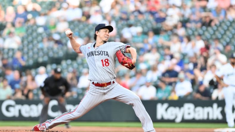 Jul 19, 2023; Seattle, Washington, USA; Minnesota Twins starting pitcher Kenta Maeda (18) pitches to the Seattle Mariners during the swconds inning at T-Mobile Park. Mandatory Credit: Steven Bisig-USA TODAY Sports