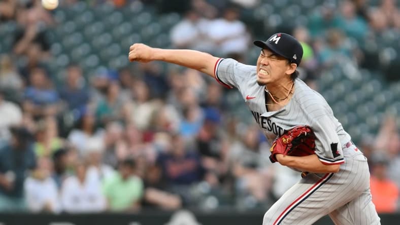 Jul 19, 2023; Seattle, Washington, USA; Minnesota Twins starting pitcher Kenta Maeda (18) pitches to the Seattle Mariners during the seventh inning at T-Mobile Park. Mandatory Credit: Steven Bisig-USA TODAY Sports