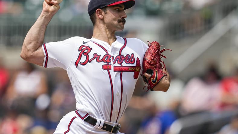 Jul 20, 2023; Cumberland, Georgia, USA; Atlanta Braves starting pitcher Spencer Strider (99) pitches against the Arizona Diamondbacks during the first inning at Truist Park. Mandatory Credit: Dale Zanine-USA TODAY Sports