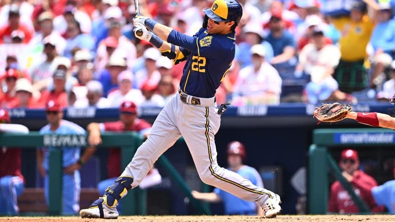 Jul 20, 2023; Philadelphia, Pennsylvania, USA; Milwaukee Brewers outfielder Christian Yelich (22) hits a three-run home run against the Philadelphia Phillies in the third inning at Citizens Bank Park. Mandatory Credit: Kyle Ross-USA TODAY Sports