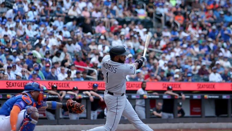 Jul 20, 2023; New York City, New York, USA; Chicago White Sox second baseman Elvis Andrus (1) follows through on an RBI sacrifice fly against the New York Mets during the second inning at Citi Field. Mandatory Credit: Brad Penner-USA TODAY Sports