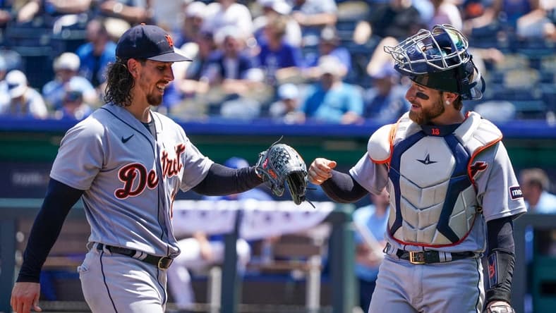 Jul 20, 2023; Kansas City, Missouri, USA; Detroit Tigers catcher Eric Haase (13) congratulates starting pitcher Michael Lorenzen (21) against the Kansas City Royals at the end of the fourth inning at Kauffman Stadium. Mandatory Credit: Denny Medley-USA TODAY Sports