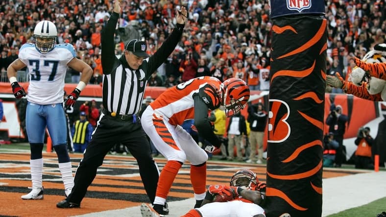 Tennessee Titans safety Calvin Lowry (37) watches as Cincinnati Bengals wide receiver Chad Johnson (85) and teammate Chris Henry (15) celebrate a touchdown in the fourth quarter during their game at Paul Brown Stadium.
November 25, 2007 (photo GEORGE WALKER IV / THE TENNESSEAN)
