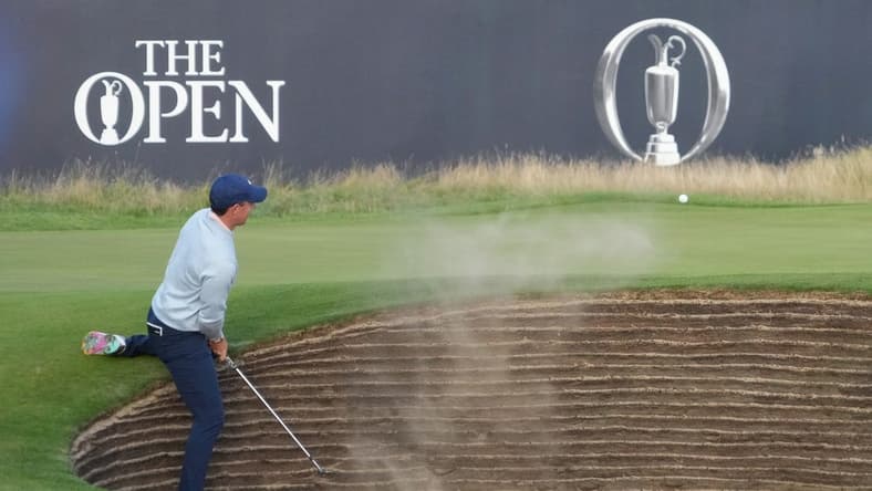 July 20, 2023; Hoylake, England, GBR; Rory McIlroy plays a shot from a bunker on the 18th hole during the first round of The Open Championship golf tournament at Royal Liverpool. Mandatory Credit: Kyle Terada-USA TODAY Sports