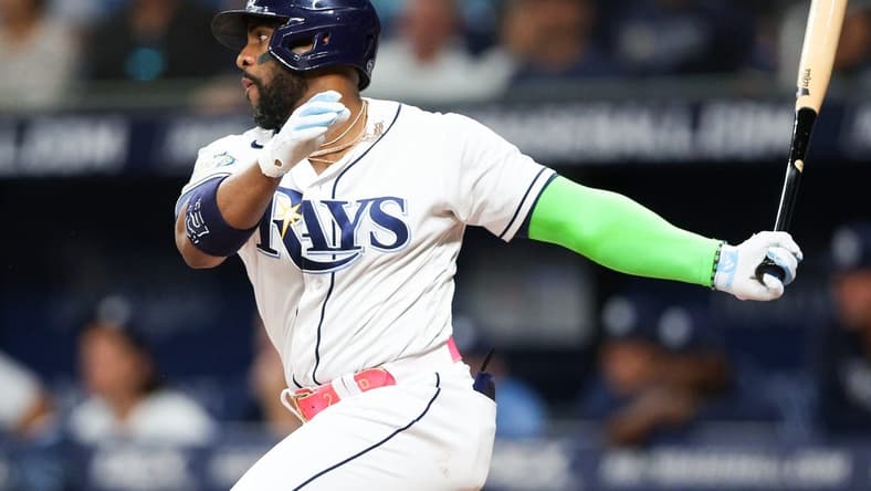 Jul 20, 2023; St. Petersburg, Florida, USA; Tampa Bay Rays designated hitter Yandy Diaz (2) hits a two rbi double against the Baltimore Orioles in the seventh inning at Tropicana Field. Mandatory Credit: Nathan Ray Seebeck-USA TODAY Sports