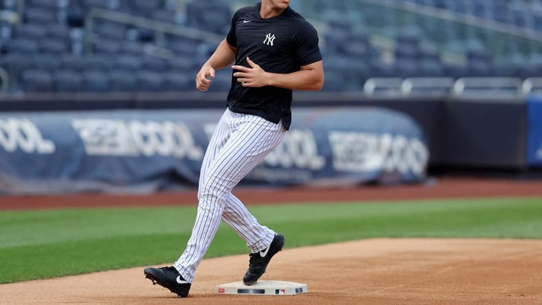 Jul 21, 2023; Bronx, New York, USA; New York Yankees injured outfielder Aaron Judge (99) works out before a game against the Kansas City Royals at Yankee Stadium. Mandatory Credit: Brad Penner-USA TODAY Sports