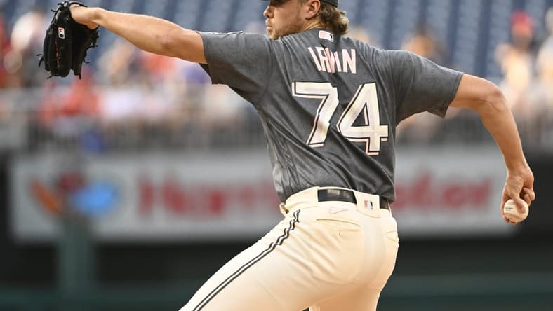 Jul 21, 2023; Washington, District of Columbia, USA; Washington Nationals starting pitcher Jake Irvin (74) throws to the San Francisco Giants during the first inning at Nationals Park. Mandatory Credit: Brad Mills-USA TODAY Sports