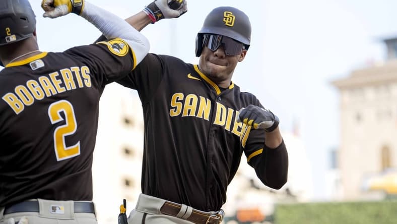 Jul 21, 2023; Detroit, Michigan, USA; San Diego Padres left fielder Juan Soto (22) (right) celebrates with shortstop Xander Bogaerts (2) after hitting a two-run home run off Detroit Tigers starting pitcher Reese Olson (45) (not pictured) in the third inning at Comerica Park. Mandatory Credit: Lon Horwedel-USA TODAY Sports