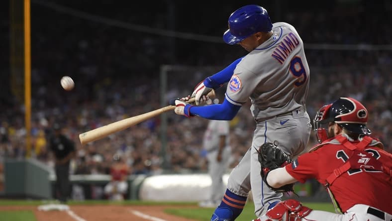 Jul 21, 2023; Boston, Massachusetts, USA;  New York Mets center fielder Brandon Nimmo (9) hits a two-run home run during the third inning against the Boston Red Sox at Fenway Park. Mandatory Credit: Bob DeChiara-USA TODAY Sports