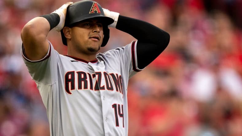 Arizona Diamondbacks catcher Gabriel Moreno (14) reacts to being struck out in the second inning of the Baseball game between the Cincinnati Reds and the Arizona Diamondbacks at Great American Ball Park in Cincinnati on Friday, July 21, 2023.
