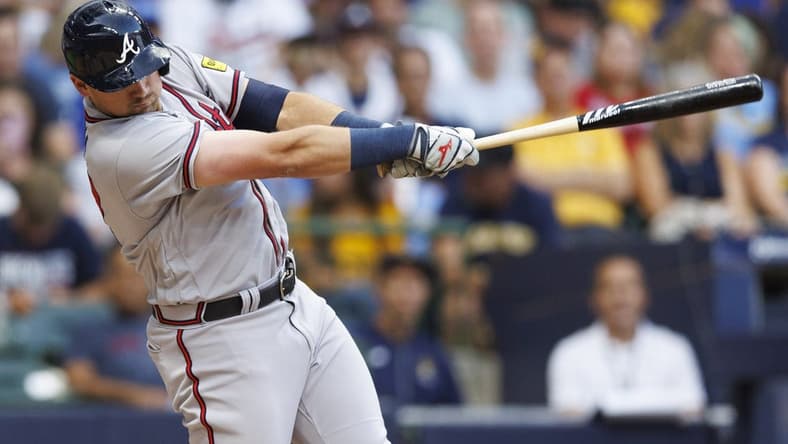 Jul 21, 2023; Milwaukee, Wisconsin, USA;  Atlanta Braves third baseman Austin Riley (27) hits a home run during the third inning against the Milwaukee Brewers at American Family Field. Mandatory Credit: Jeff Hanisch-USA TODAY Sports