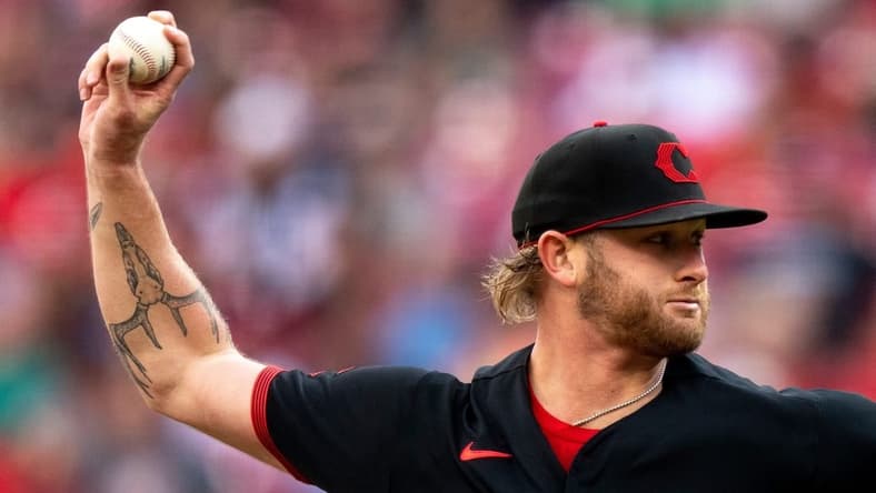 Cincinnati Reds starting pitcher Ben Lively (59) delivers the pitch in the first inning of the Baseball game between the Cincinnati Reds and the Arizona Diamondbacks at Great American Ball Park in Cincinnati on Friday, July 21, 2023.