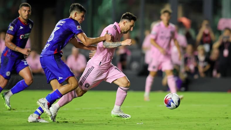 Jul 21, 2023; Fort Lauderdale, FL, USA; Inter Miami CF forward Lionel Messi (10) dribbles the ball against Cruz Azul defender Rafael Guerrero (33) during the second half at DRV PNK Stadium. Mandatory Credit: Sam Navarro-USA TODAY Sports