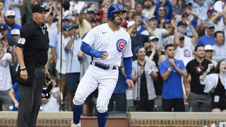 Jul 22, 2023; Chicago, Illinois, USA; Chicago Cubs center fielder Mike Tauchman (40) scores against the St. Louis Cardinals during the sixth inning at Wrigley Field. Mandatory Credit: Matt Marton-USA TODAY Sports