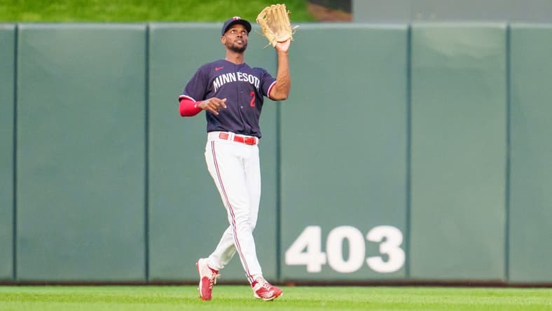Jul 22, 2023; Minneapolis, Minnesota, USA; Minnesota Twins center fielder Michael A. Taylor (2) catches a ball hit by Chicago White Sox shortstop Tim Anderson (7) in the fifth inning at Target Field. Mandatory Credit: Matt Blewett-USA TODAY Sports