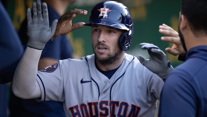 Jul 22, 2023; Oakland, California, USA; Houston Astros third baseman Alex Bregman (2) is greeted by his teammates after hitting a solo home run against the Oakland Athletics during the sixth inning at Oakland-Alameda County Coliseum. Mandatory Credit: D. Ross Cameron-USA TODAY Sports