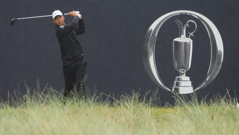Jul 23, 2023; Hoylake, England, GBR; Tom Kim plays his shot from the first tee during the final round of The Open Championship golf tournament. Mandatory Credit: Kyle Terada-USA TODAY Sports