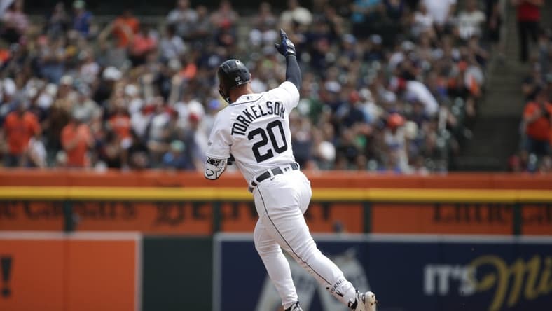 Jul 23, 2023; Detroit, Michigan, USA; Detroit Tigers infielder Spencer Torkelson (20) hits a home run during the first inning of the game against the San Diego Padres at Comerica Park. Mandatory Credit: Brian Bradshaw Sevald-USA TODAY Sports