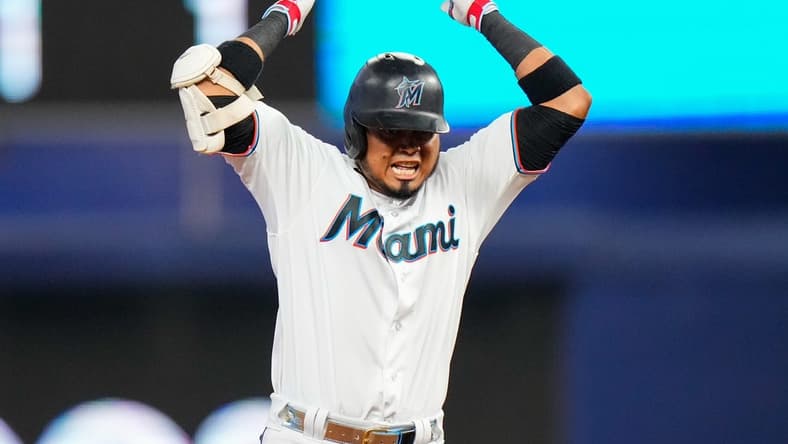 Jul 23, 2023; Miami, Florida, USA; Miami Marlins second baseman Luis Arraez (3) celebrates hitting a double against the Colorado Rockies during the sixth inning at loanDepot Park. Mandatory Credit: Rich Storry-USA TODAY Sports