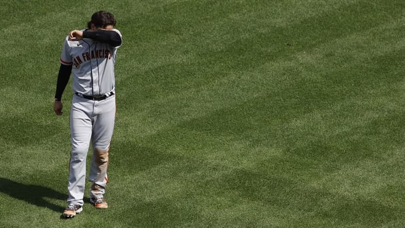 Jul 23, 2023; Washington, District of Columbia, USA; San Francisco Giants first baseman Wilmer Flores (41) reacts after being doubled up at first base Washington Nationals during the eighth inning at Nationals Park. Mandatory Credit: Geoff Burke-USA TODAY Sports