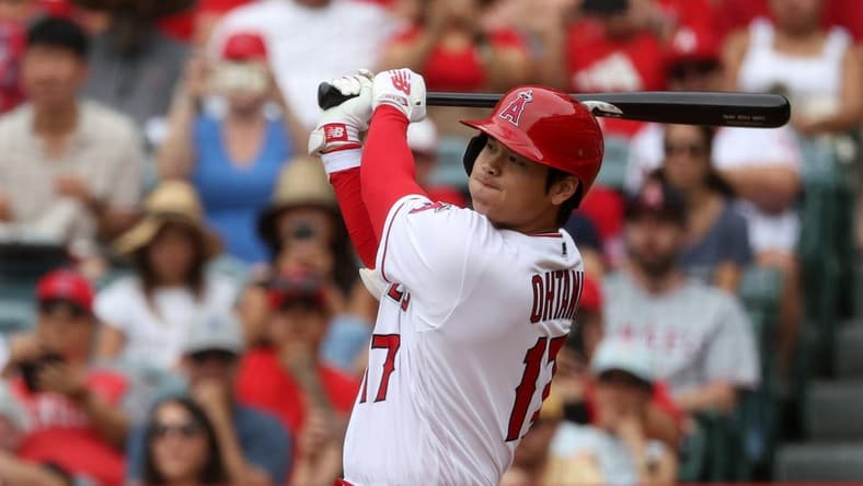 Jul 23, 2023; Anaheim, California, USA;  Los Angeles Angels designated hitter Shohei Ohtani (17) hits a home run during the first inning against the Pittsburgh Pirates at Angel Stadium. Mandatory Credit: Kiyoshi Mio-USA TODAY Sports