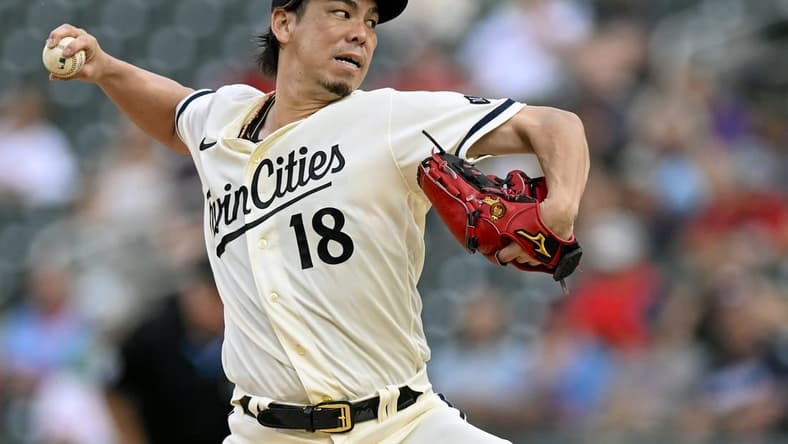 Jul 24, 2023; Minneapolis, Minnesota, USA;  Minnesota Twins pitcher Kenta Maeda (18) delivers a pitch against the Seattle Mariners during the first inning at Target Field. Mandatory Credit: Nick Wosika-USA TODAY Sports