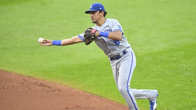Jul 24, 2023; Cleveland, Ohio, USA; Kansas City Royals second baseman Nicky Lopez (8) throws to first base in the fourth inning against the Cleveland Guardians at Progressive Field. Mandatory Credit: David Richard-USA TODAY Sports