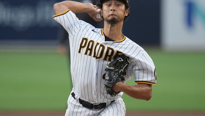 Jul 24, 2023; San Diego, California, USA; San Diego Padres starting pitcher Yu Darvish (11) throws a pitch against the Pittsburgh Pirates during the first inning at Petco Park. Mandatory Credit: Ray Acevedo-USA TODAY Sports