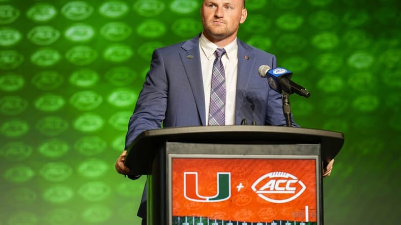 Jul 25, 2023; Charlotte, NC, USA;  Miami quarterback Tyler Van Dyke answers questions during ACC Media Days at The Westin Charlotte. Mandatory Credit: Jim Dedmon-USA TODAY Sports