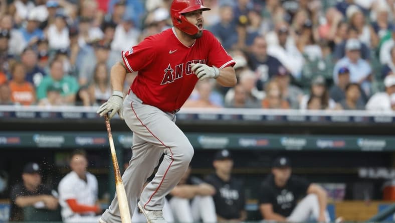 Jul 25, 2023; Detroit, Michigan, USA; Los Angeles Angels first baseman Mike Moustakas (8) hits a single in the fifth inning against the Detroit Tigers at Comerica Park. Mandatory Credit: Rick Osentoski-USA TODAY Sports