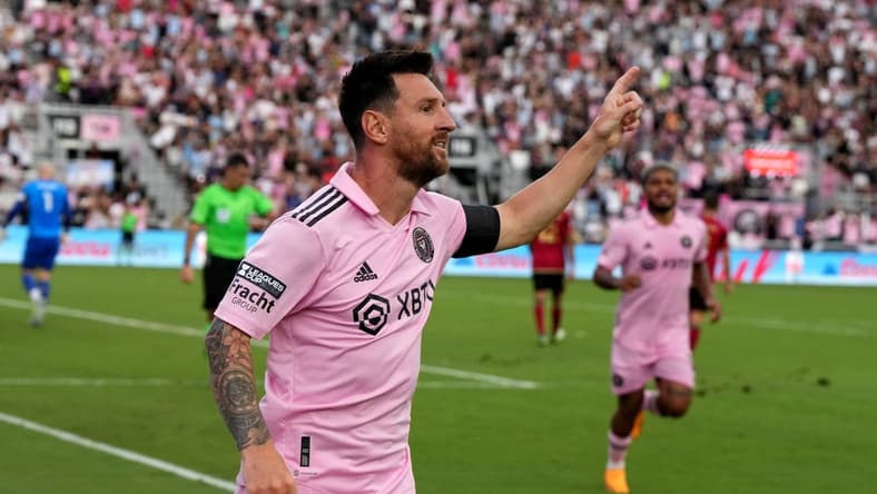Jul 25, 2023; Fort Lauderdale, FL, USA; Inter Miami CF forward Lionel Messi (10) celebrates after scoring a goal in the first half against the Atlanta United at DRV PNK Stadium. Mandatory Credit: Jasen Vinlove-USA TODAY Sports