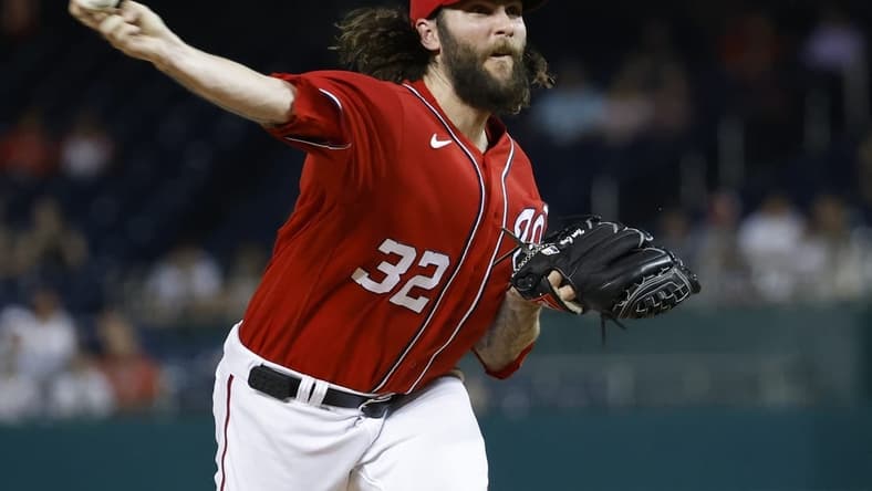 Jul 25, 2023; Washington, District of Columbia, USA; Washington Nationals starting pitcher Trevor Williams (32) pitches against the Colorado Rockies during the first inning at Nationals Park. Mandatory Credit: Geoff Burke-USA TODAY Sports