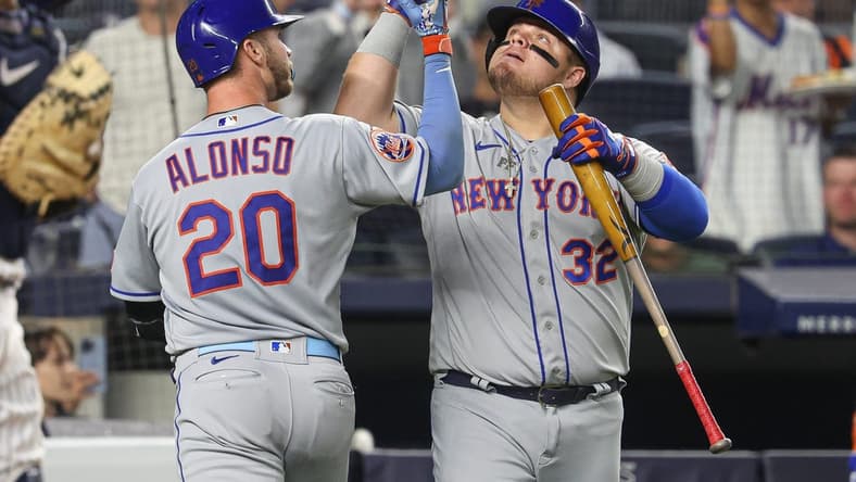 Jul 25, 2023; Bronx, New York, USA; New York Mets first baseman Pete Alonso (20) celebrates his solo home run with designated hitter Daniel Vogelbach (32) during the sixth inning against the New York Yankees at Yankee Stadium. Mandatory Credit: Vincent Carchietta-USA TODAY Sports