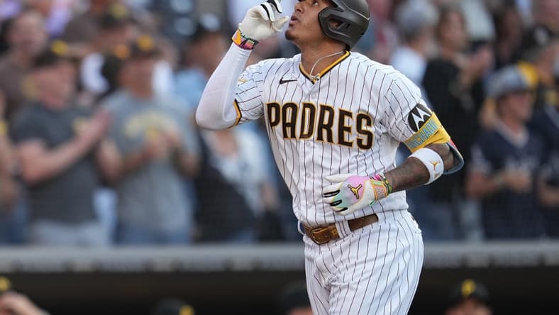 Jul 25, 2023; San Diego, California, USA; San Diego Padres third baseman Manny Machado (13) reacts to his home run against the Pittsburgh Pirates during the second inning at Petco Park. Mandatory Credit: Ray Acevedo-USA TODAY Sports
