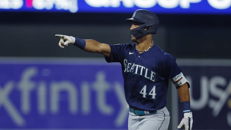 Jul 25, 2023; Minneapolis, Minnesota, USA; Seattle Mariners center fielder Julio Rodriguez (44) celebrates his two-run home run against the Minnesota Twins in the eighth inning at Target Field. Mandatory Credit: Bruce Kluckhohn-USA TODAY Sports