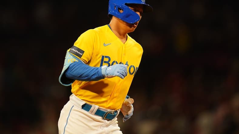 Jul 25, 2023; Boston, Massachusetts, USA; Boston Red Sox left fielder Masataka Yoshida (7) hits a two run home run against the Atlanta Braves in the eighth inning at Fenway Park. Mandatory Credit: David Butler II-USA TODAY Sports