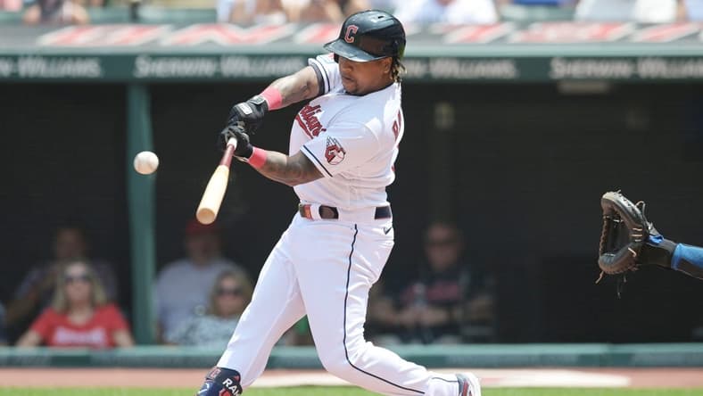 Jul 26, 2023; Cleveland, Ohio, USA; Cleveland Guardians designated hitter Jose Ramirez (11) hits a home run during the first inning against the Kansas City Royals at Progressive Field. Mandatory Credit: Ken Blaze-USA TODAY Sports