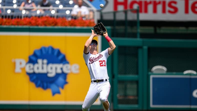 Jul 26, 2023; Washington, District of Columbia, USA; Washington Nationals left fielder Corey Dickerson (23) catches a fly ball during the sixth inning against the Colorado Rockies at Nationals Park. Mandatory Credit: Reggie Hildred-USA TODAY Sports