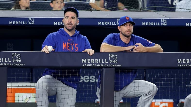 Jul 26, 2023; Bronx, New York, USA; New York Mets starting pitchers Justin Verlander (35) and Max Scherzer (21) watch from the dugout during the sixth inning against the New York Yankees at Yankee Stadium. Mandatory Credit: Brad Penner-USA TODAY Sports
