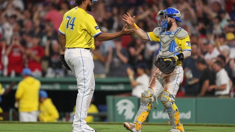 Jul 26, 2023; Boston, Massachusetts, USA; Boston Red Sox relief pitcher Kenley Jansen (74) and Boston Red Sox catcher Connor Wong (12) celebrate after defeating the Atlanta Braves at Fenway Park. Mandatory Credit: Paul Rutherford-USA TODAY Sports