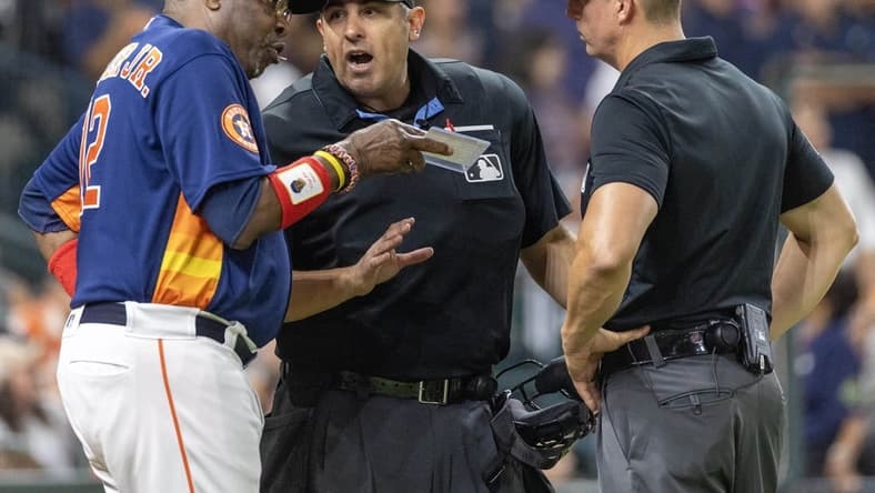 Jul 26, 2023; Houston, Texas, USA;Houston Astros manager Dusty Baker Jr. (12) argues with home plate umpire Mark Ripperger after Houston Astros catcher Martin Maldonado (15) ws ejected from the game in the fifth inning at Minute Maid Park. Mandatory Credit: Thomas Shea-USA TODAY Sports
