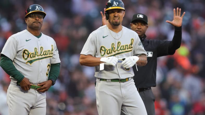Jul 26, 2023; San Francisco, California, USA;  Oakland Athletics third baseman Jace Peterson (6) hits a two-RBI triple during the fourth inning against the San Francisco Giants at Oracle Park. Mandatory Credit: Sergio Estrada-USA TODAY Sports