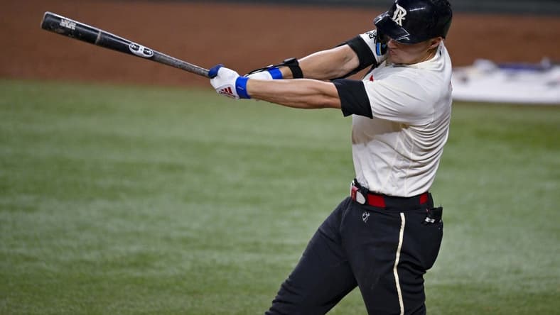 Jul 21, 2023; Arlington, Texas, USA; Texas Rangers shortstop Corey Seager (5) in action during the game between the Texas Rangers and the Los Angeles Dodgers at Globe Life Field. Mandatory Credit: Jerome Miron-USA TODAY Sports