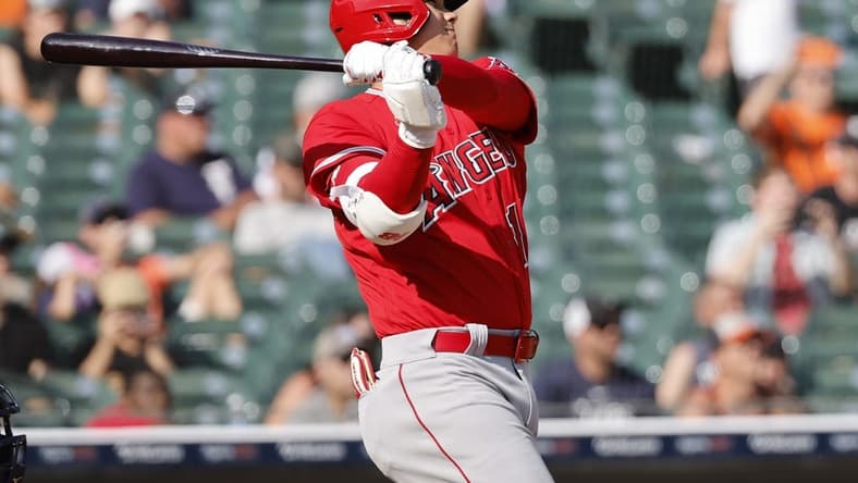 Jul 27, 2023; Detroit, Michigan, USA; Los Angeles Angels starting pitcher Shohei Ohtani (17) hits a home run in the fourth inning against the Detroit Tigers at Comerica Park. Mandatory Credit: Rick Osentoski-USA TODAY Sports