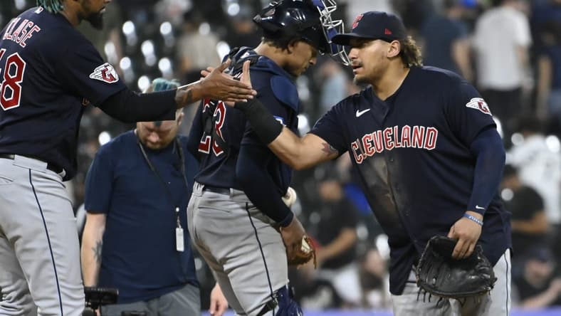 Jul 27, 2023; Chicago, Illinois, USA; Cleveland Guardians relief pitcher Emmanuel Clase (48) high fives first baseman Josh Naylor (22) after the game against the Chicago White Sox at Guaranteed Rate Field. Mandatory Credit: Matt Marton-USA TODAY Sports