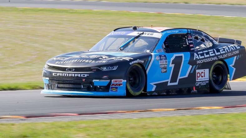 Sam Mayer (1) exits turn 3 during qualifying for the Road America 180, in the NASCAR Xfinity Series at Road America, Friday, July 28, 2023, near Plymouth, Wis.