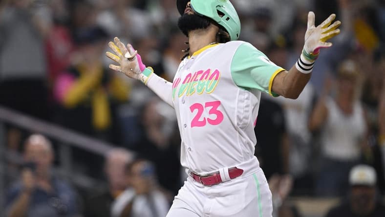 Jul 28, 2023; San Diego, California, USA; San Diego Padres right fielder Fernando Tatis (23) celebrates after hitting a home run against the Texas Rangers during the fifth inning at Petco Park. Mandatory Credit: Orlando Ramirez-USA TODAY Sports