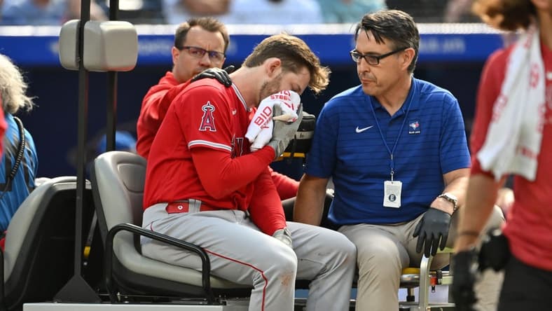 Jul 29, 2023; Toronto, Ontario, CAN; Los Angeles Angels left fielder Taylor Ward (3) is taken off the field on a cart after being struck on the head by a pitch thrown by Toronto Blue Jays pitcher Alek Manoah in the fifth inning at Rogers Centre. Mandatory Credit: Dan Hamilton-USA TODAY Sports