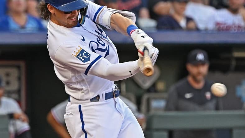 Jul 29, 2023; Kansas City, Missouri, USA; Kansas City Royals shortstop Bobby Witt Jr. (7) hits an RBI single during the second inning against the Minnesota Twins at Kauffman Stadium. Mandatory Credit: Peter Aiken-USA TODAY Sports